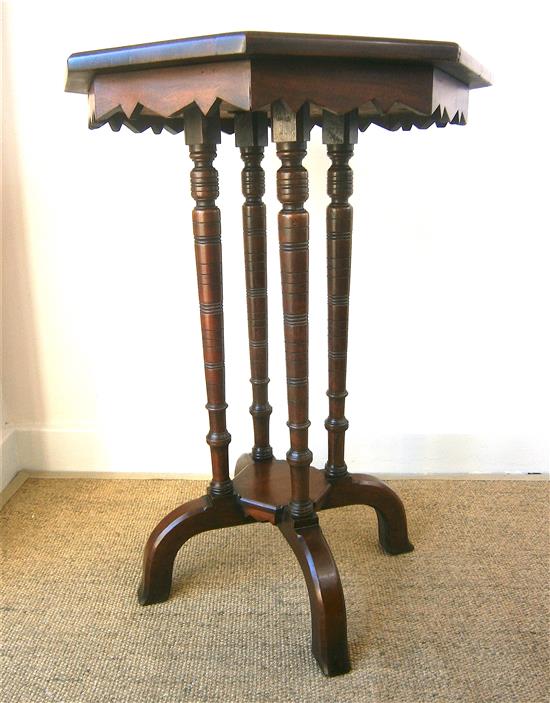 A Victorian mahogany octagonal table and a Liberty ebonised Hampden table Larger H.70cm